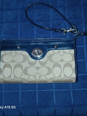 Coach Beige Signature Canvas Wristlet with Navy Leather Trim